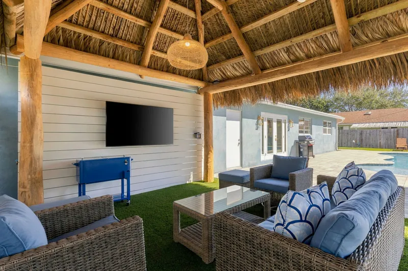 Tiki hut with a 65-inch TV